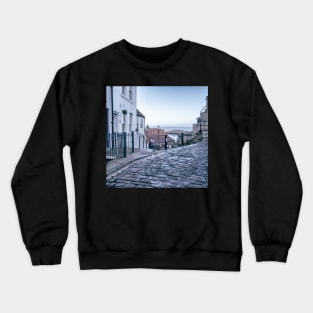 Whitby town cobbled streets and seaview Crewneck Sweatshirt